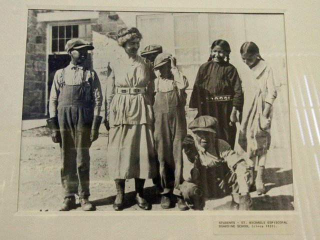 The federal government forces Native-American children to attend off-reservation schools.