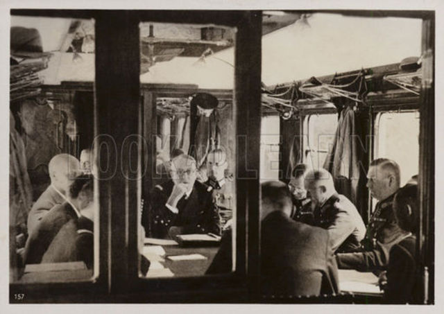 Germany signs the armistice at compiegne, France
