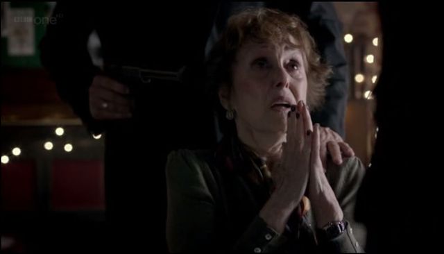 Mrs. Hudson is assaulted by the CIA