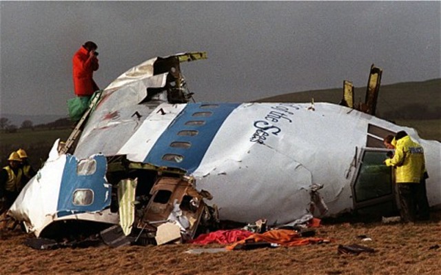 Pan Am Flight 103 Explodes over Lockerbie, Scotland, Killing 270