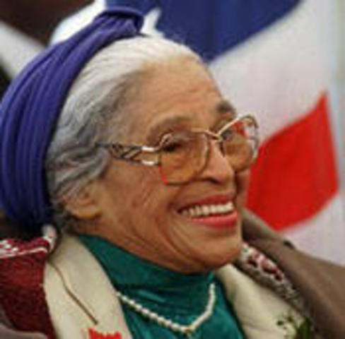 Speaks at the Million Man March.