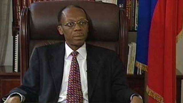 Aristide goes into exile again