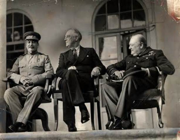Roosevelt, Churchill, Stalin meet at Teheran.