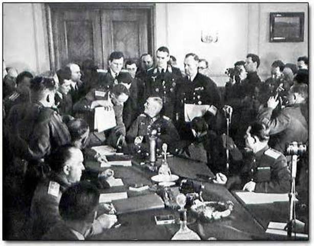 Unconditional surrender of all German forces to Allies.