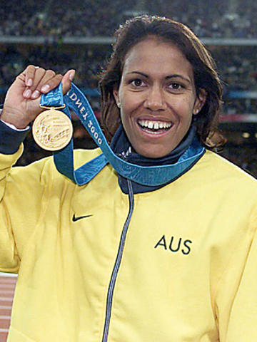 Cathy Freeman wins a Gold Medal in the Olympics