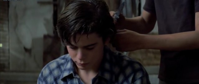 Ponyboy and Johnny disguised to hide from the police. (1)