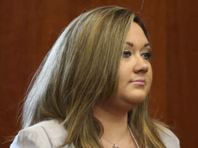 George Zimmerman's wife, Shellie, is arrested on one count of perjury.