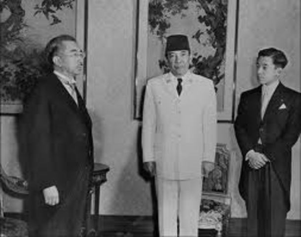 Visits Japan and meets Emperor and Prime Minister