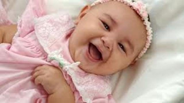 First two: Psychosocial-First laugh at the dog playing with a toy