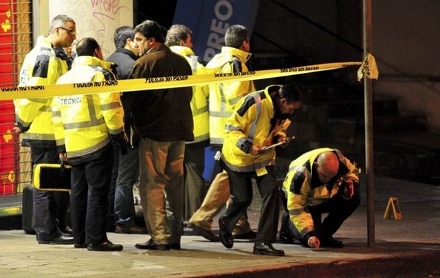 Muere un policía en rapiña a local Correo de Pocitos