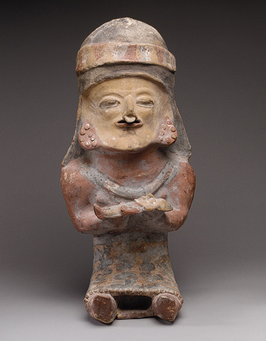 Figure Holding Child