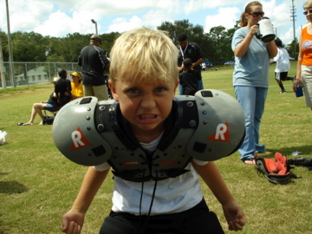 J plays football for first time.