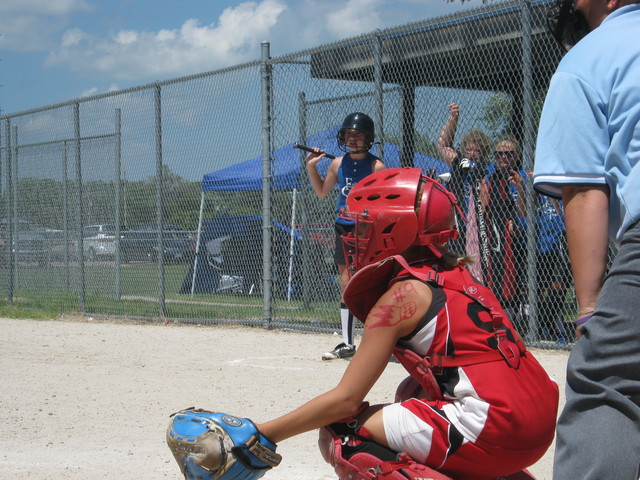 became a softball catcher