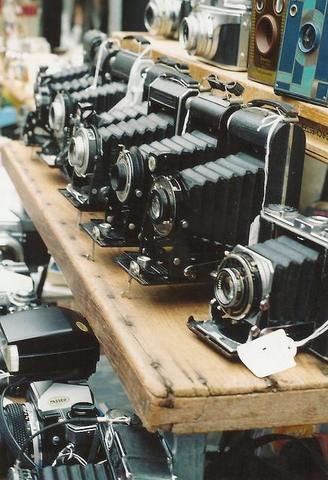 La cámara fotográfica.