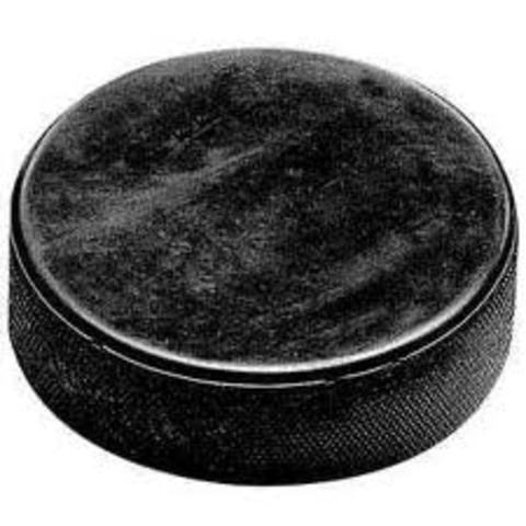 First hockey puck