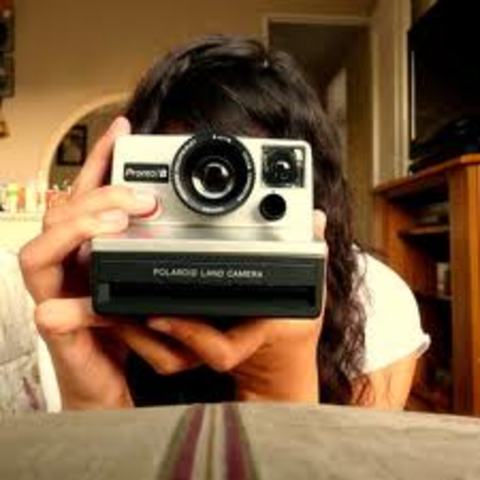 Taking pictures to send to Dad