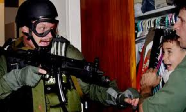 Elian Gonzalez is Deported by Force of US Federal Agents Back to Cuba.