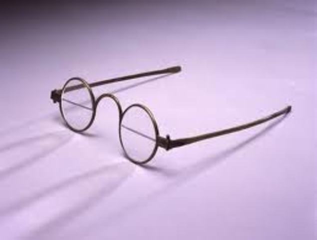 Benjamin Franklin invents bifocal lenses.