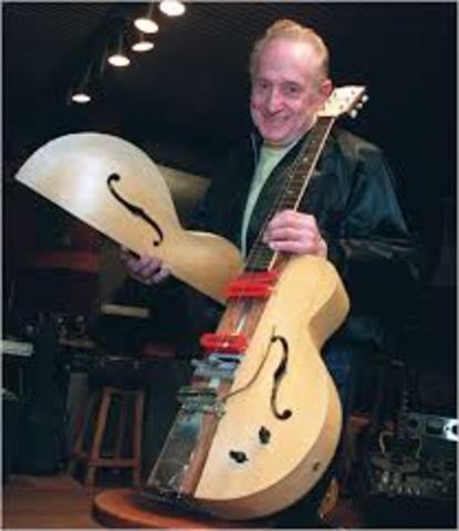 Les Paul of Gibson made "the log"