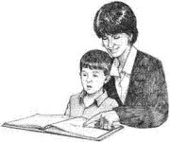 Trys to teach his friends how to read but is stopped.