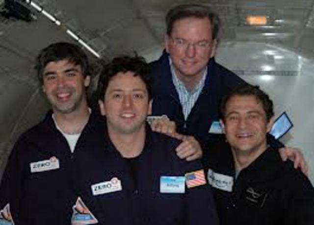 Page, junto a Sergey Brin y Schmidt.