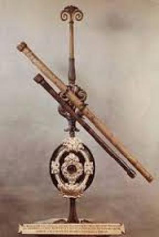 Galileo Galilei creates a three-powered telescope.
