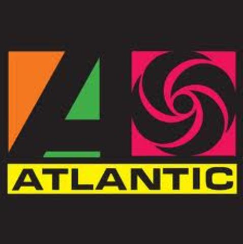 Firmo con tlantic Records