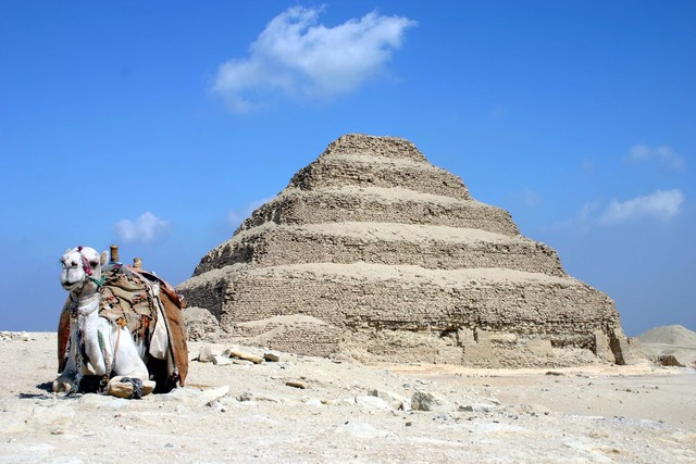 Egyptians build first pyramids