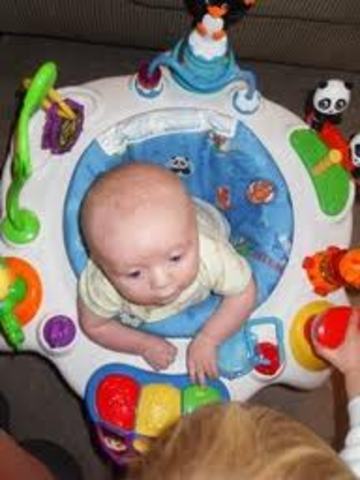 Fourth Month Old WIth Toy (Around the World)