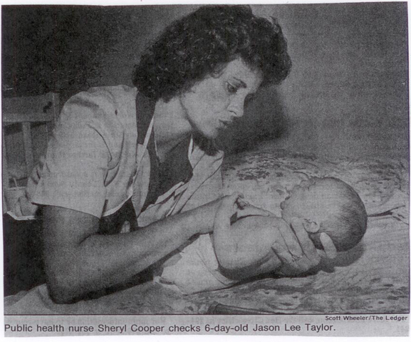 Nurse Sheryl Cooper cares for Newborn