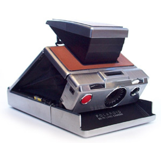 Polaroid introduces one-step instant photography with the SX-70 camera