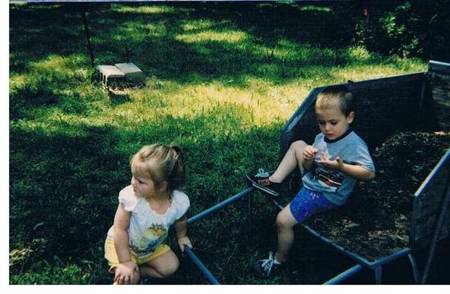 I help my great grandpa pick up sticks in the yard.