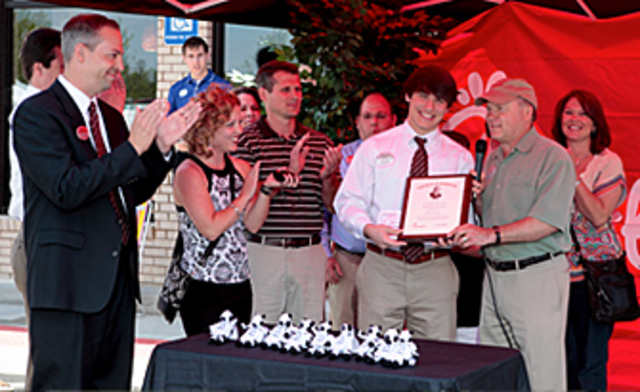 Truett Cathy creates the Team Member Scholarship Program so that restaurant employees can further his/her education