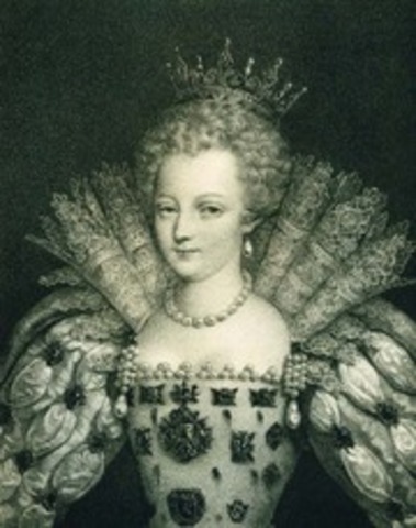 Elizabeth I restores the Protestant Church.
