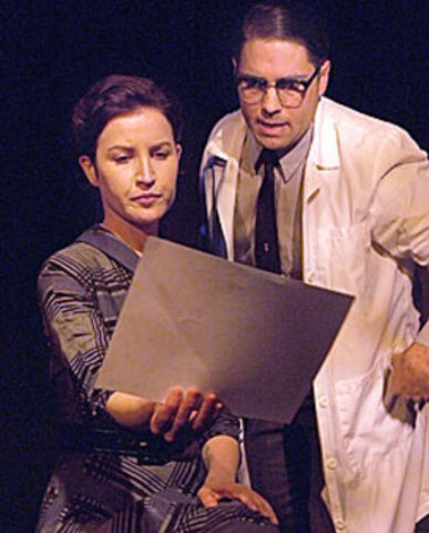 dionosed with Ovarian Cancer; continues research; asked to create large scale models and explanations of work on virus structures for display at Brussel World's Fair.