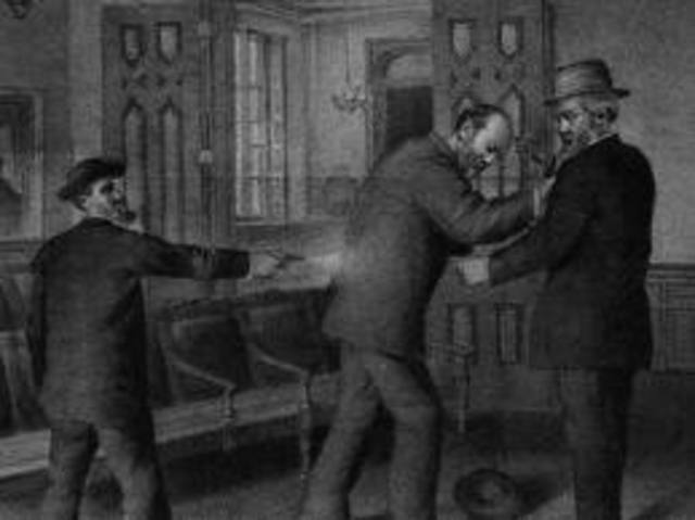 Garfield is shot in the back