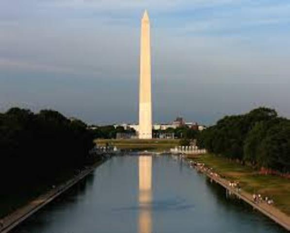 Washington Monument dedicated after 36 years of construction.
