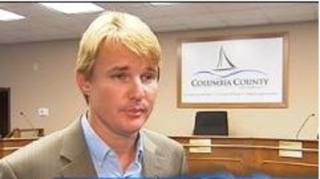 Dean resigns after indictment