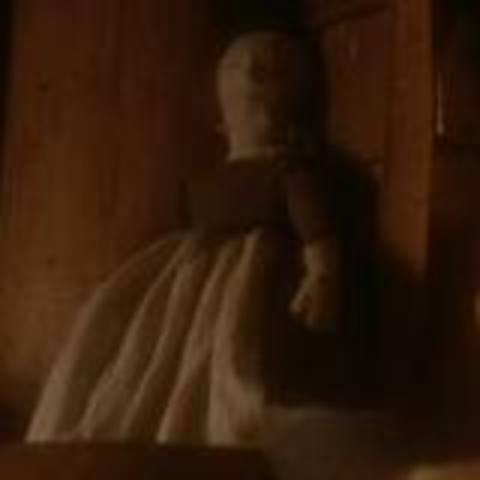 Mary Warren gives Elizabeth a poppet