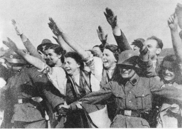 The Pact of Munich is signed