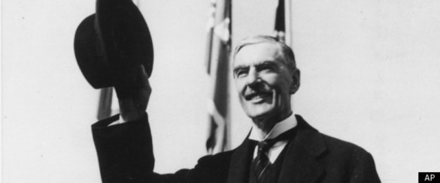 Chamberlain was passed an important note that told him that Hitler had agreed to a conference at Munich with representatives of Britain, France, and Italy.