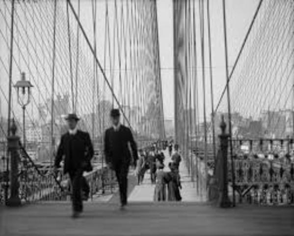 The Brooklyn Bridge is opened