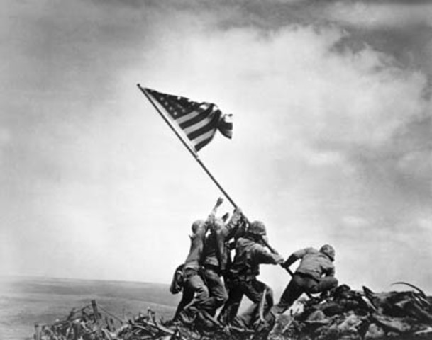 Raising the flag on Mount Suribachi