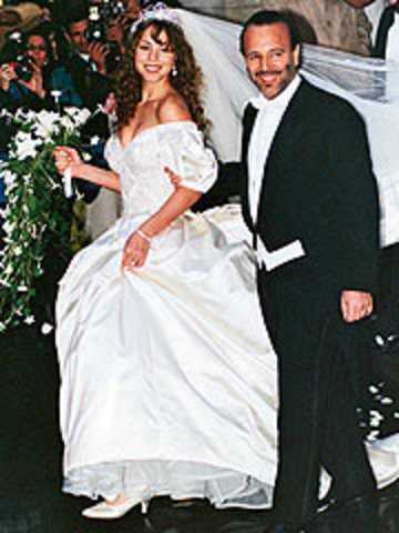 Marries Tom Mottola