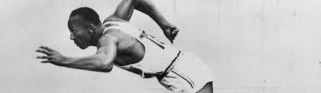jesse owens wins four gold metals at olympics in germany