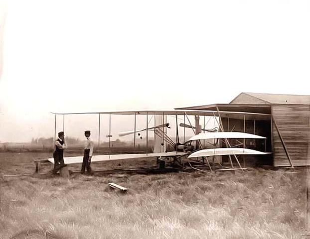 Orville and Wilbur Wright make the first flight in a fixed-wing plane