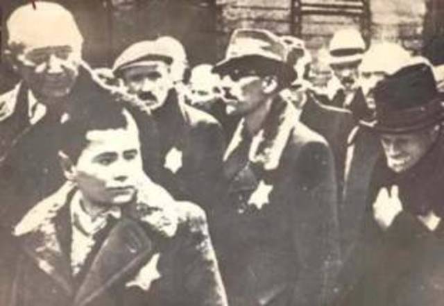 Yellow stars required to be worn by Polish Jews over age 10