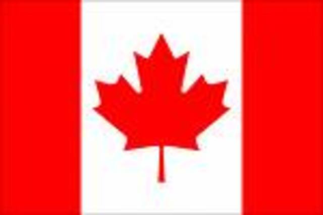 Canada flies the Maple Leaf flag for the first time.