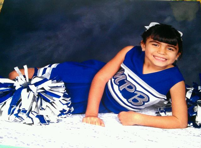 Started Kinder at Most Precious Blood Catholic School and Cheerleading