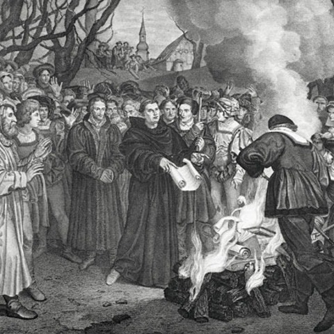 Luther burns the Papal Bull and canon law